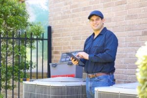 a professional is checking the air conditioner