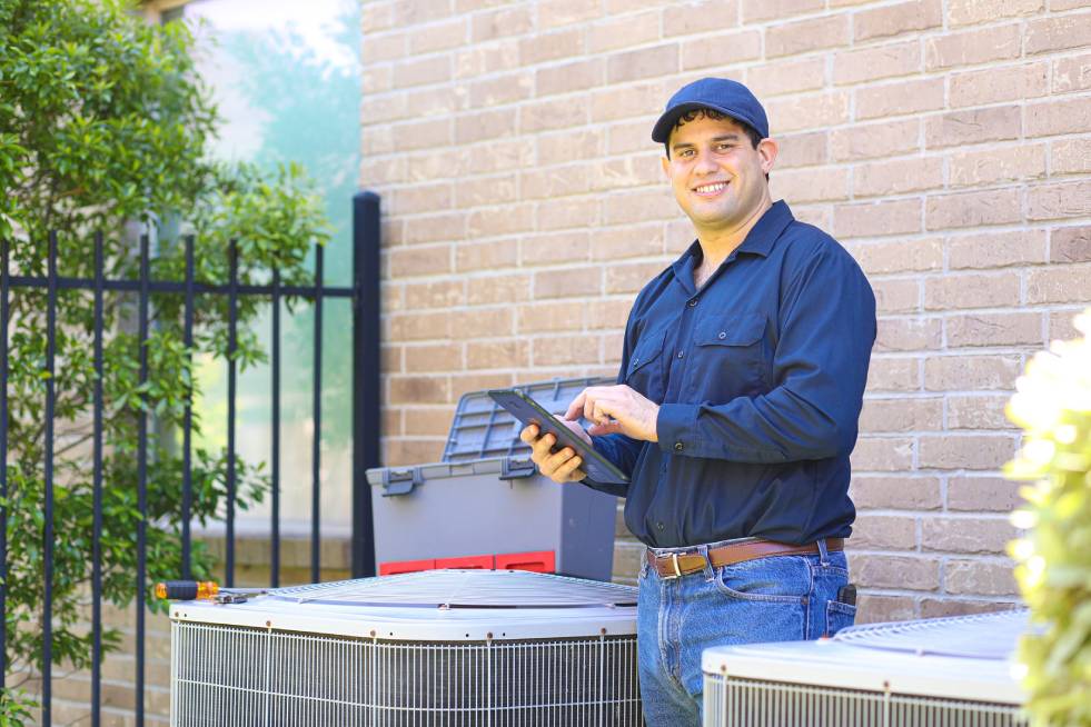 a professional is checking the heating systems