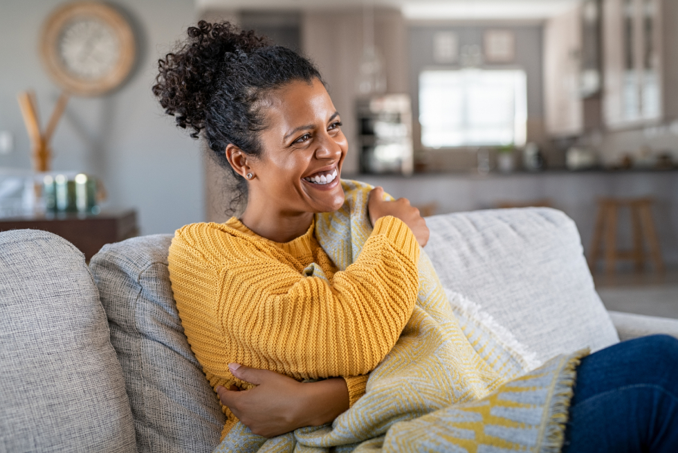 smiling women feeling cold